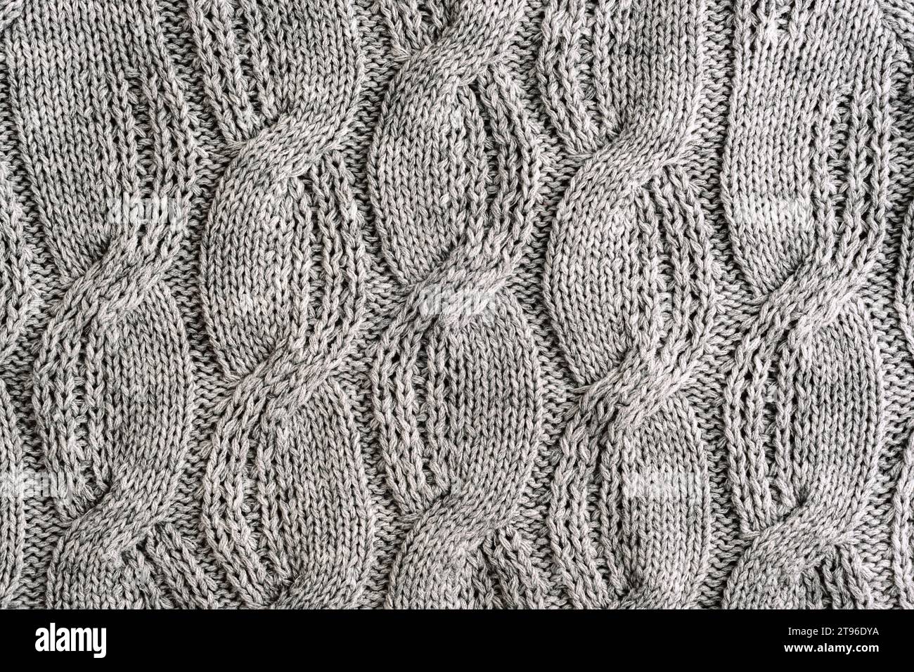 Tejido de punto de lana gris suéter, textura, fondo Foto de stock