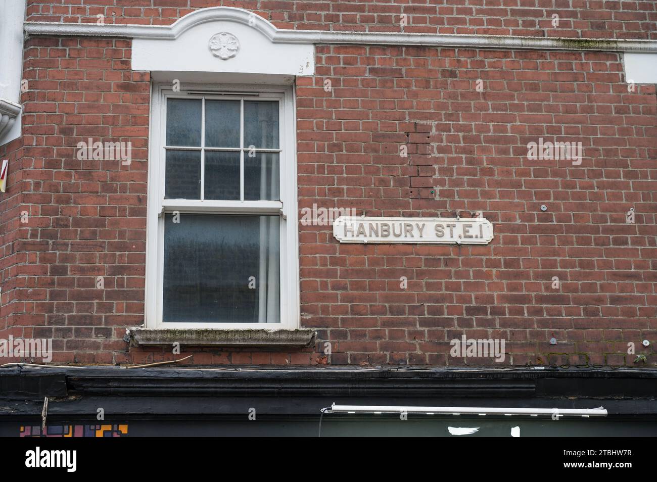 Hanbury Street signo de nombre en la pared del edificio, el este de Londres, Inglaterra, Reino Unido Foto de stock