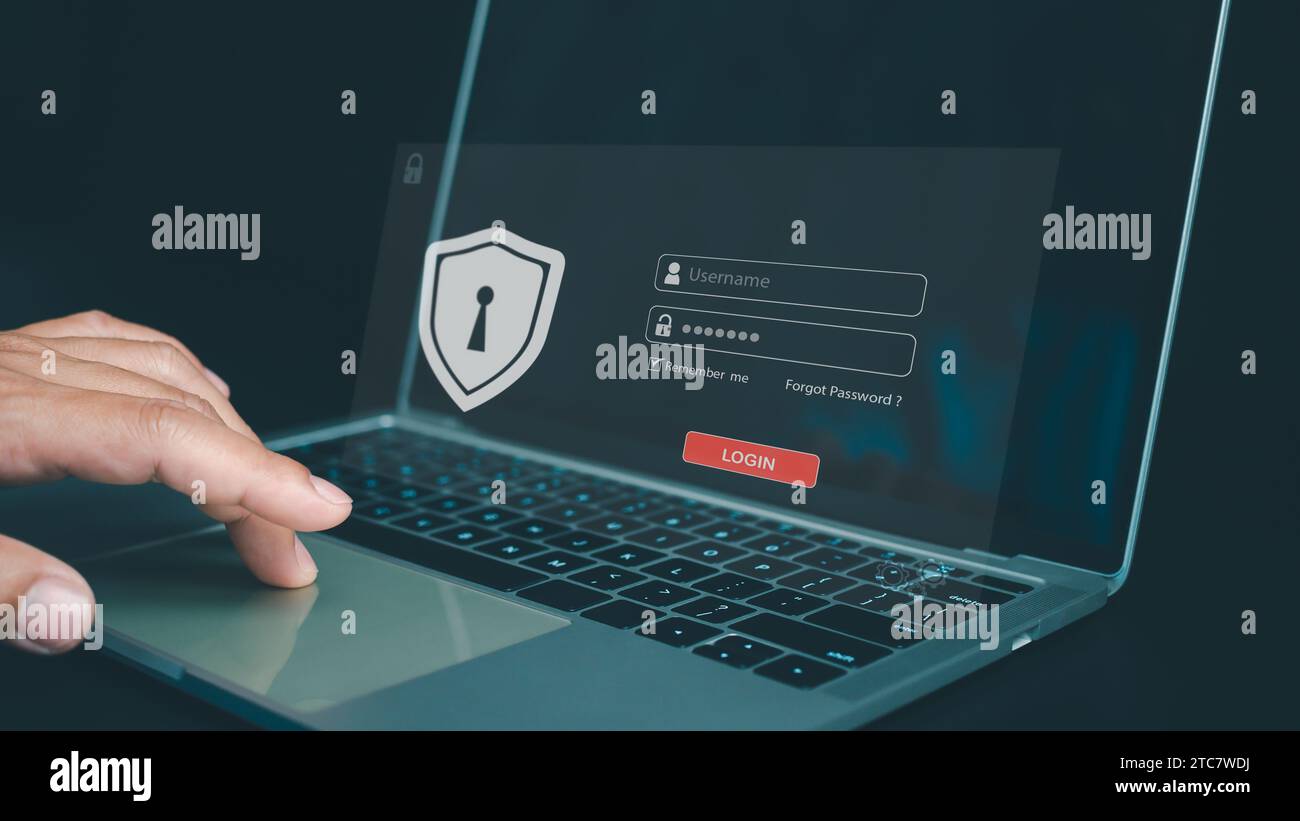 Concepto de seguridad cibernética y contraseña de inicio de sesión, manos utiliza la computadora y la introducción de nombre de usuario y contraseña de la red de datos, iniciar sesión con el ordenador portátil a infor digital Foto de stock