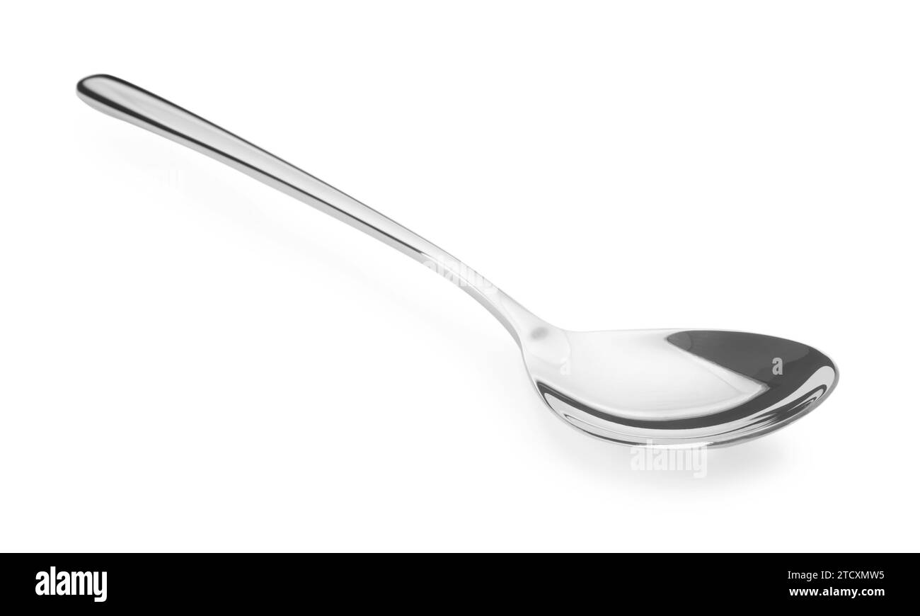 Una cuchara de plata brillante aislada en blanco Foto de stock