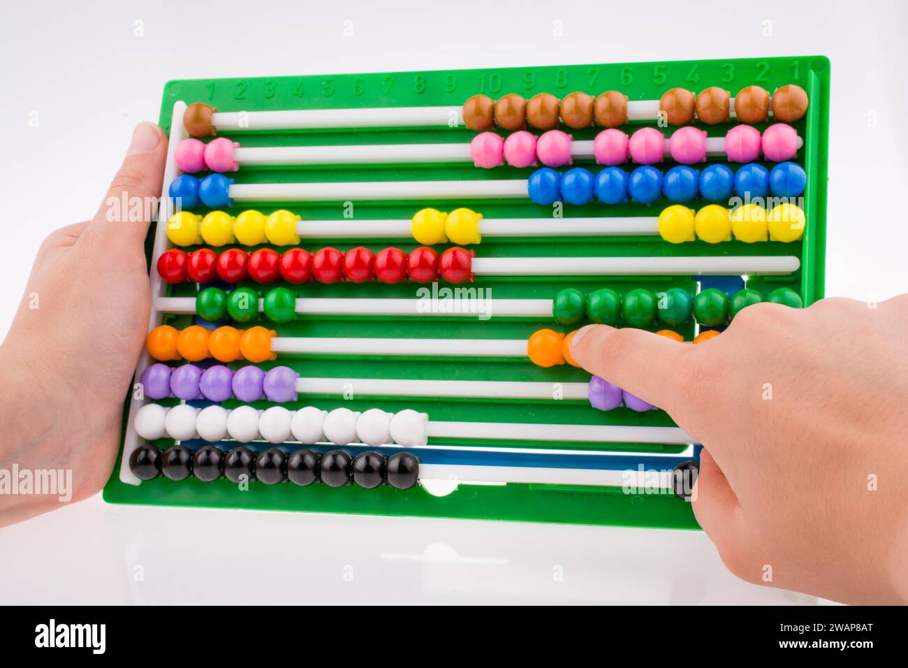 Mano con un color abacus Foto de stock