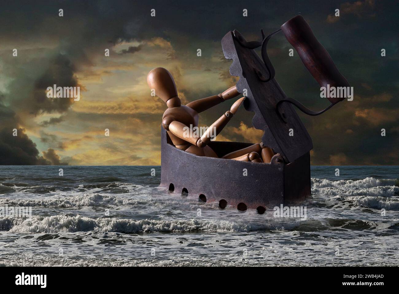 un manichino naviga su un mare in tempesta a bordo di un vecchi fero da stiro Foto de stock