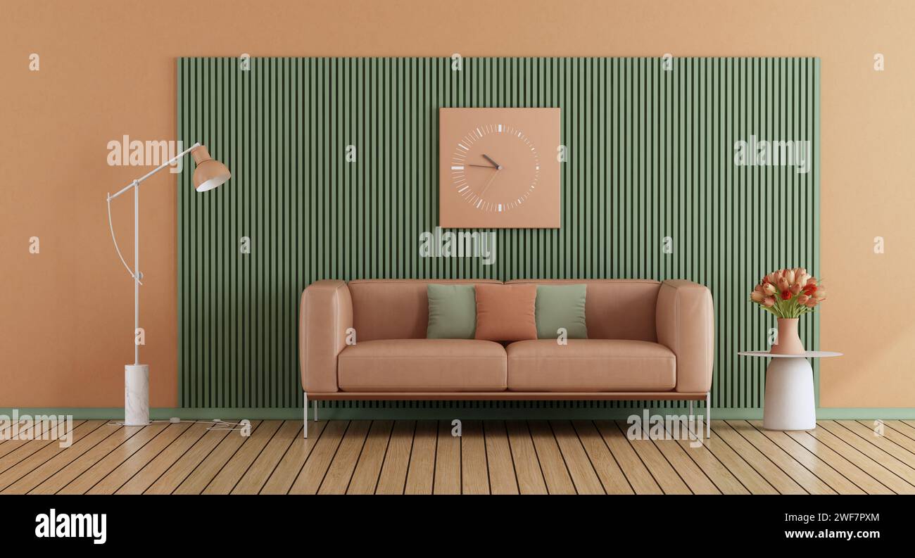 Sala de estar en color fuzz de melocotón tendencia año 2024, paneles verdes y renderizado de cuero sofá-3d. Foto de stock