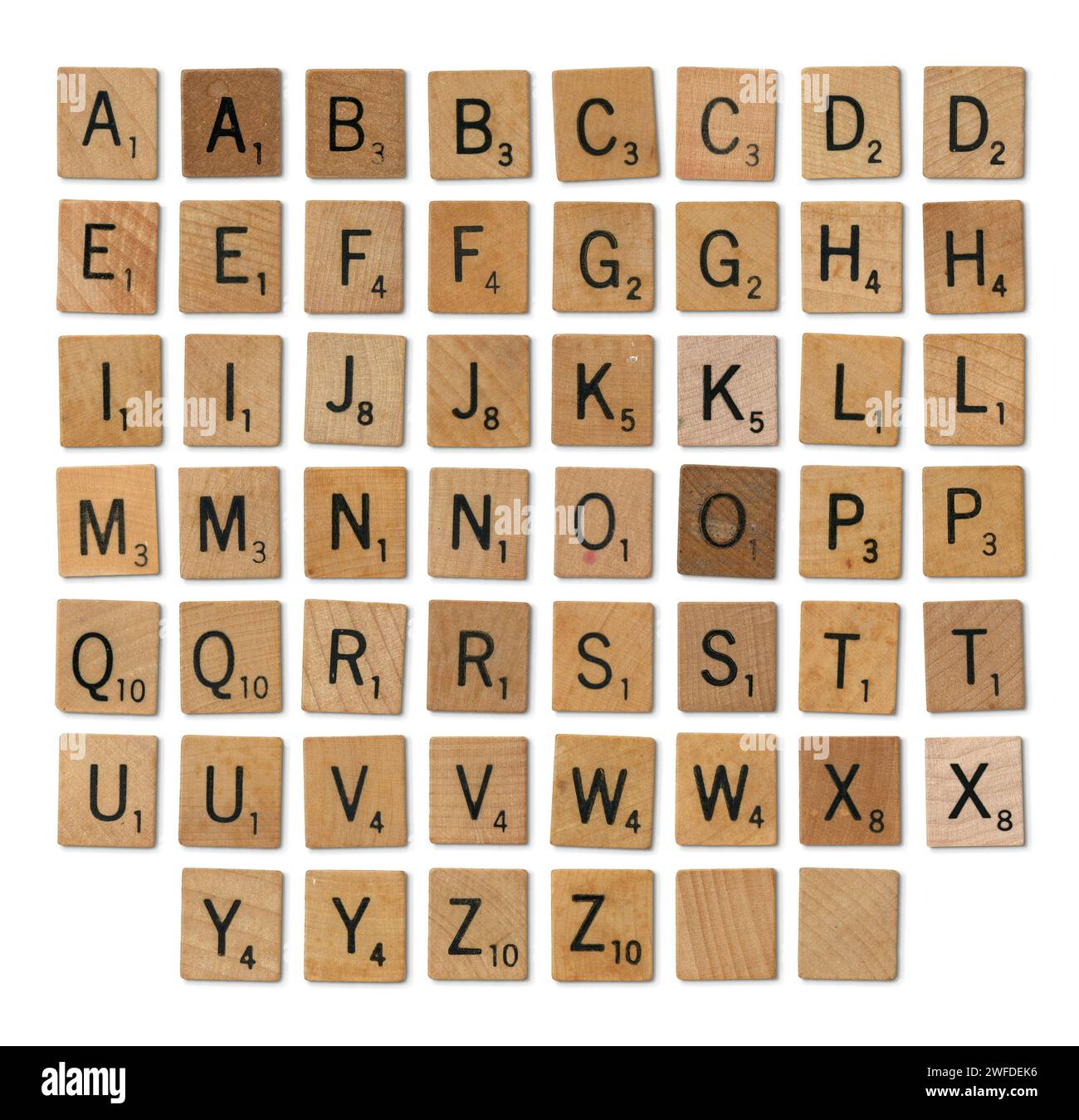 Conjunto de piezas de juego de Scrabble mixto - alfabeto completo aislado Foto de stock