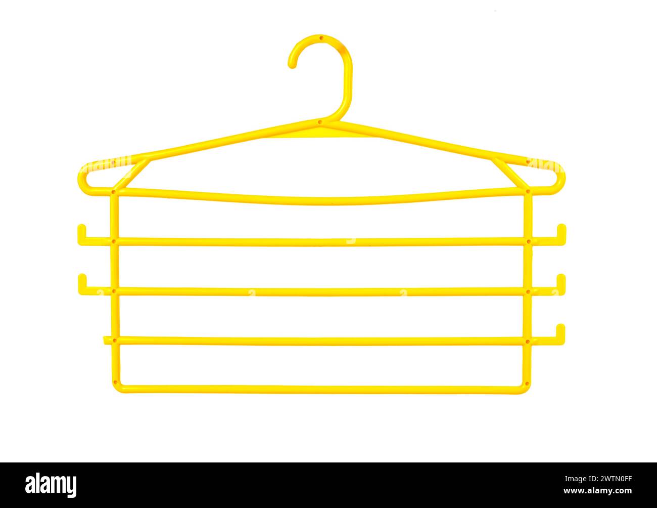 colgante amarillo organizador trempel multi-niveles para la ropa aislada sobre fondo blanco. Foto de stock