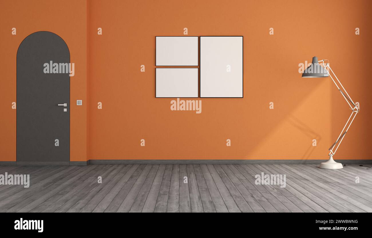 Habitación vacía con paredes naranjas, puerta arqueada sin marco, marco de imagen en blanco y lámpara de pie - representación 3D. Foto de stock