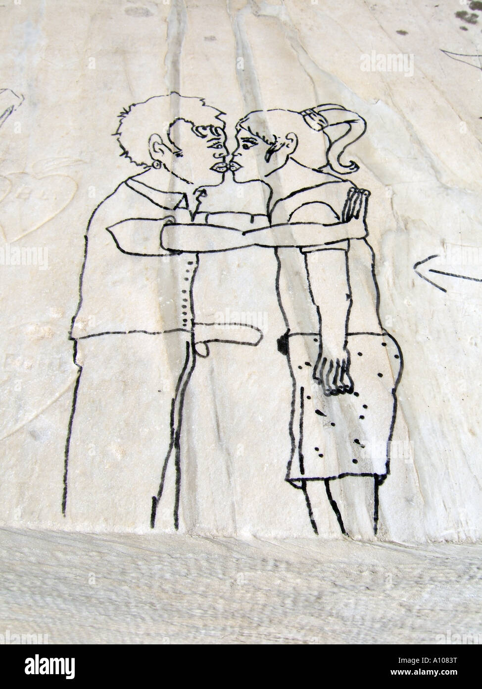 El Dibujo De La Joven Pareja Besandose En La Pared Fotografia De