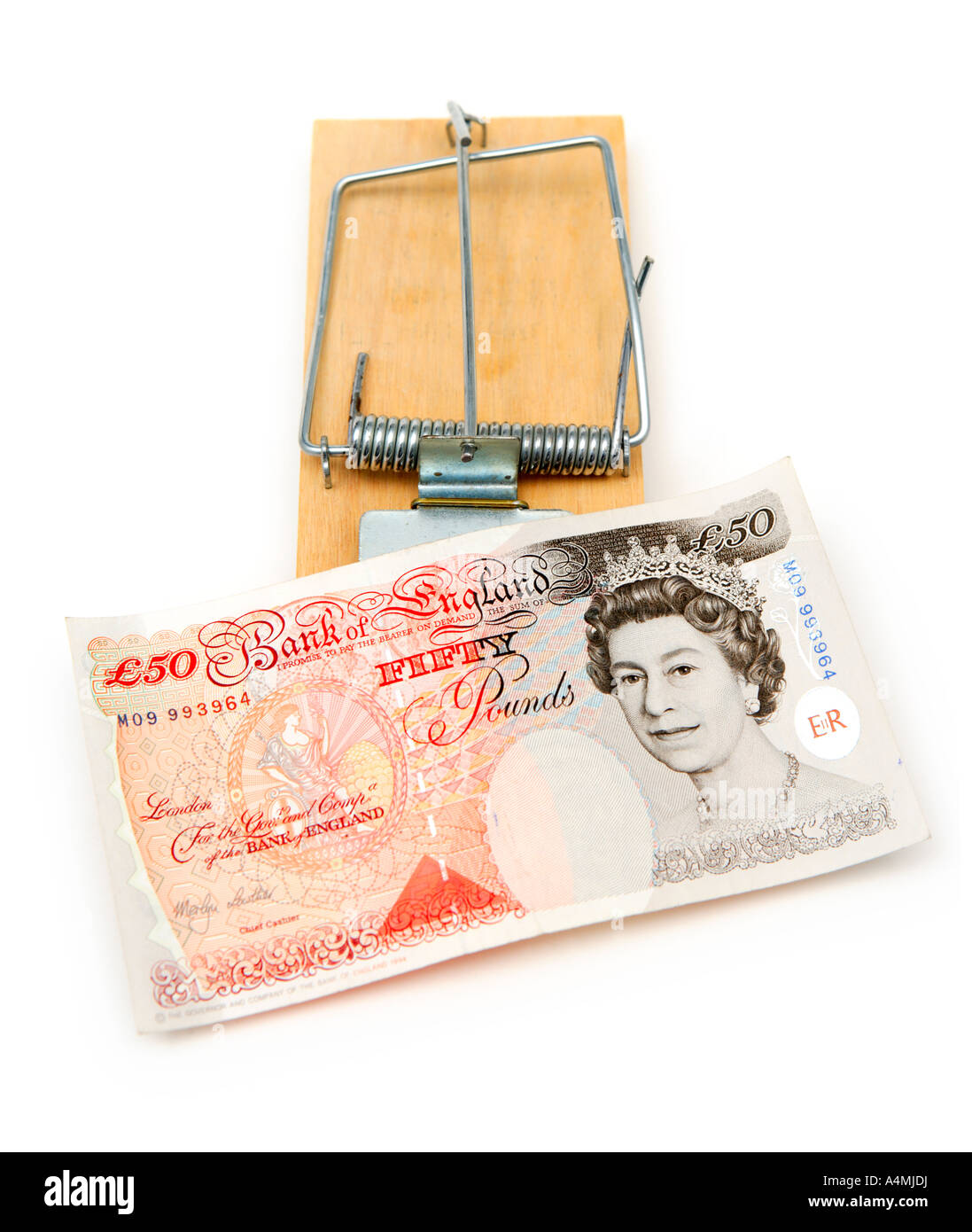 Ratonera con moneda inglesa indicando dinero trampa Foto de stock