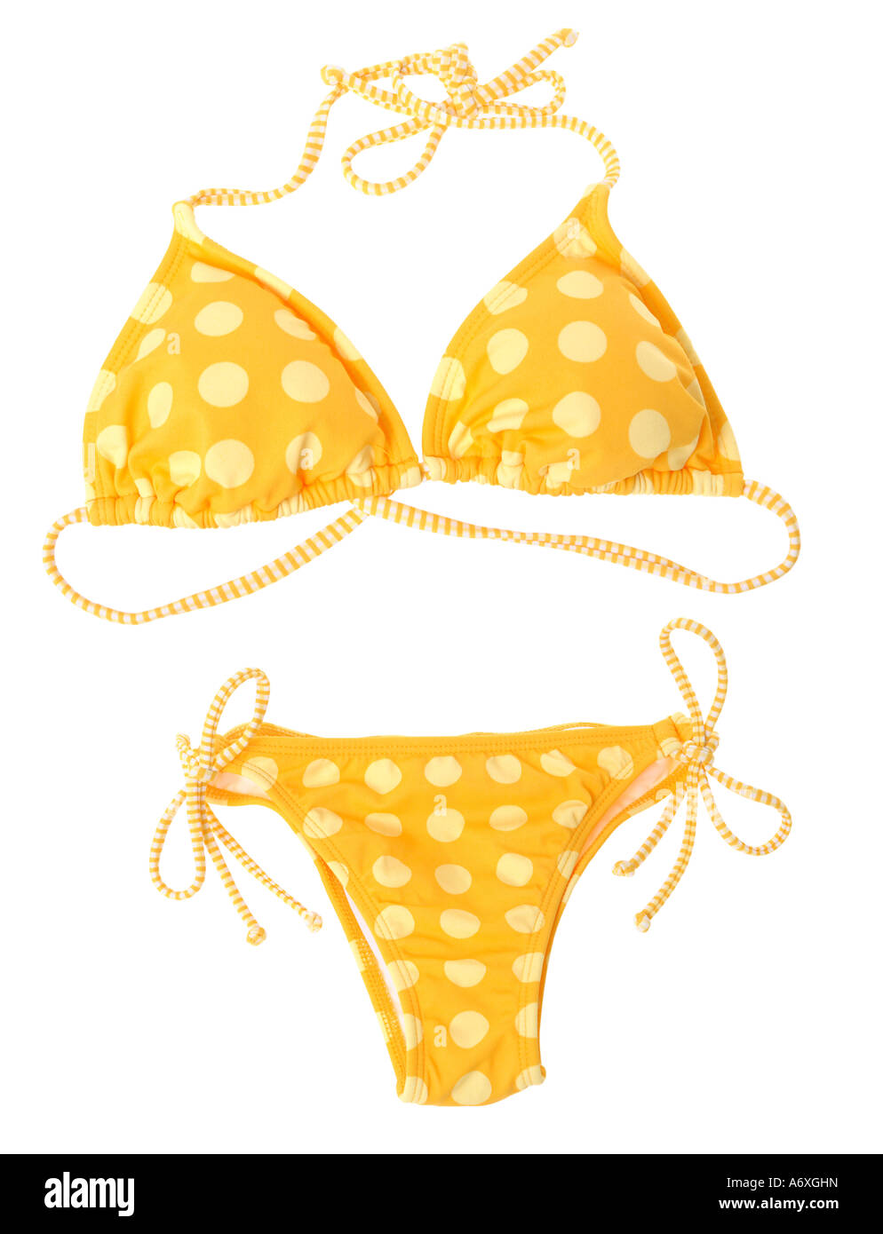 Corte bikini amarillo sobre fondo blanco. Foto de stock