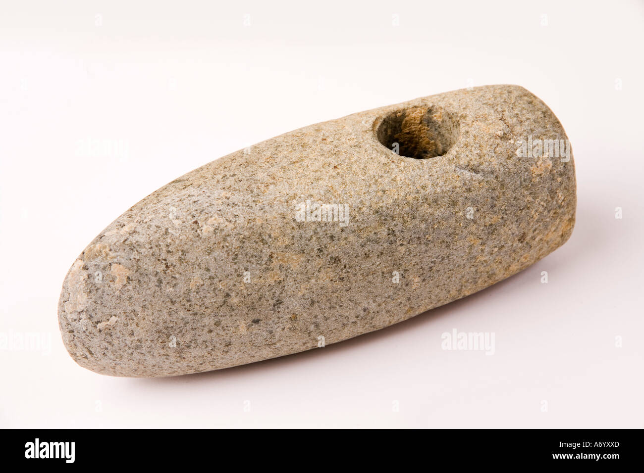 Hacha de la joven edad de piedra Foto de stock