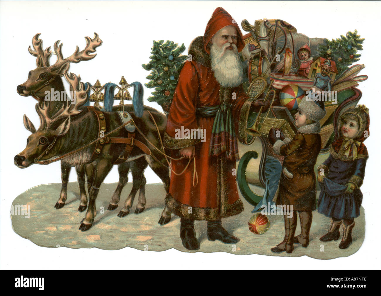Chatarra troqueladas mostrando el Padre Navidad, renos y trineo, circa 1880 Foto de stock