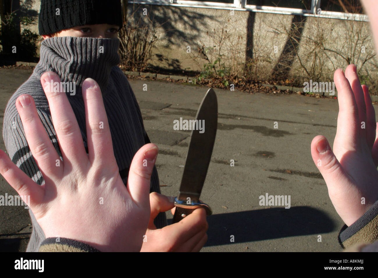 La delincuencia juvenil, el robo, el ataque, la cuchilla, AVERT Foto de stock