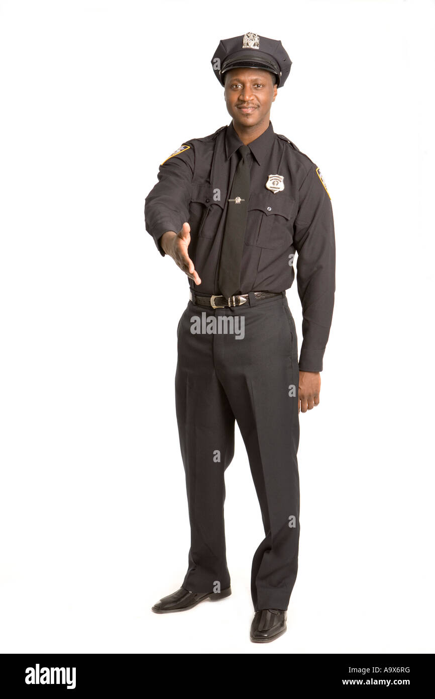 Oficial de la policía estadounidense sonriendo y ofreciendo un apretón de manos Foto de stock