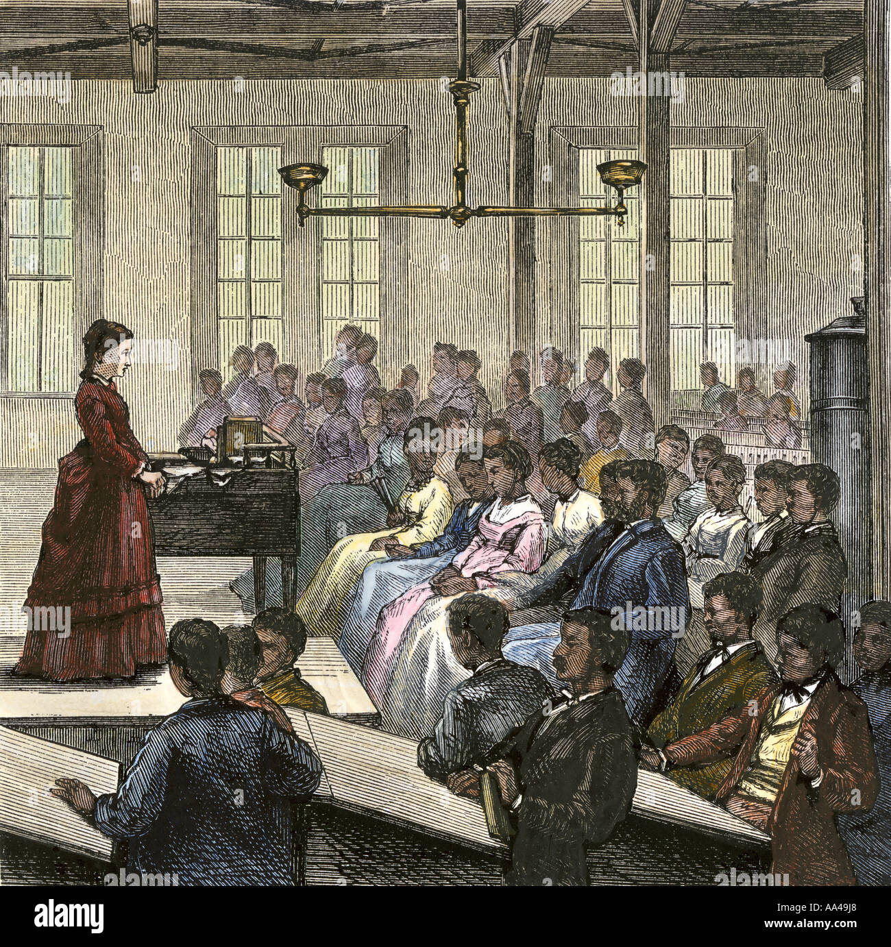 Los estudiantes afroamericanos en clase en el Instituto Hampton de Virginia en 1870. Xilografía coloreada a mano Foto de stock