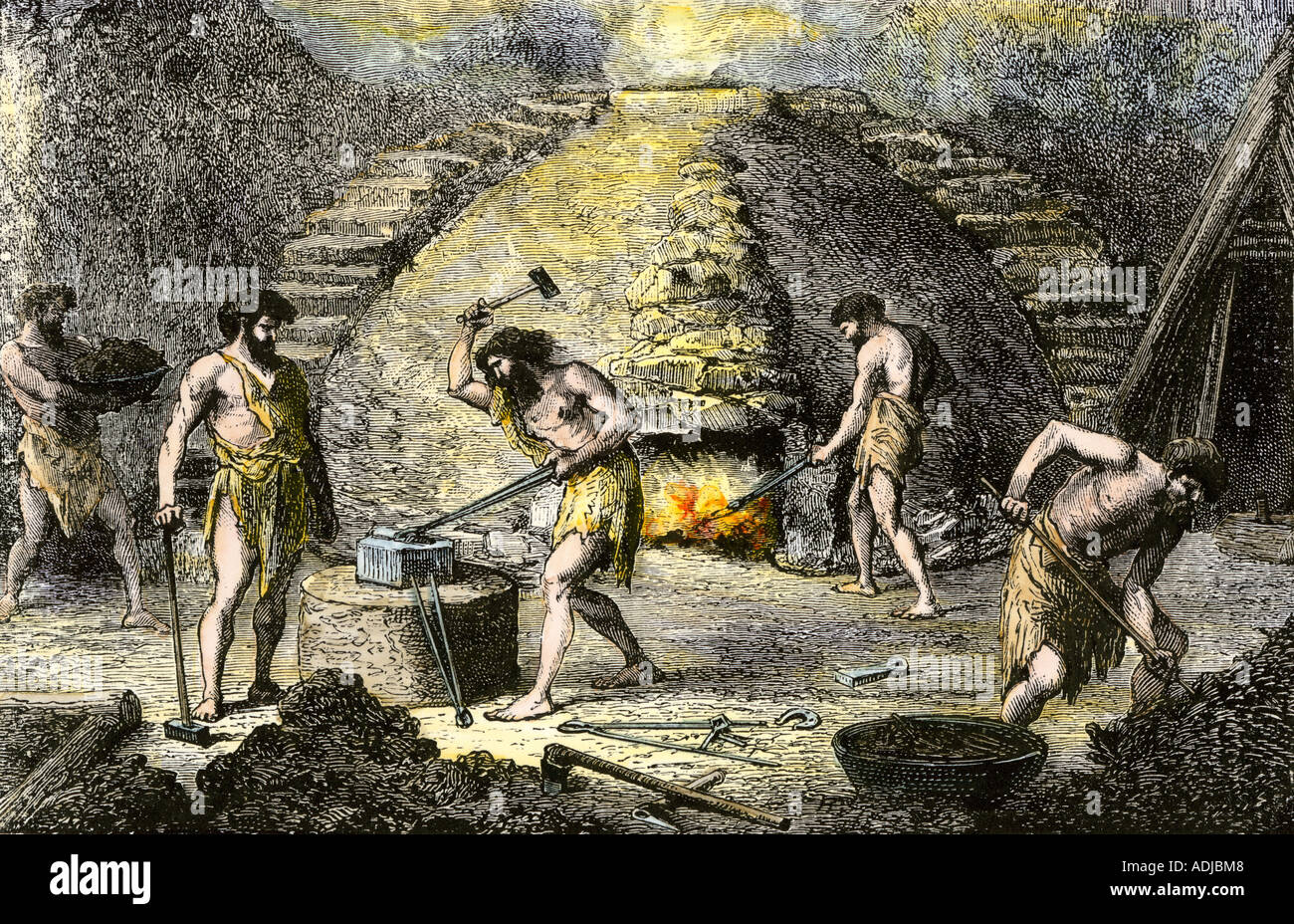 Los hombres prehistóricos aprender a trabajar el hierro. Xilografía coloreada a mano Foto de stock