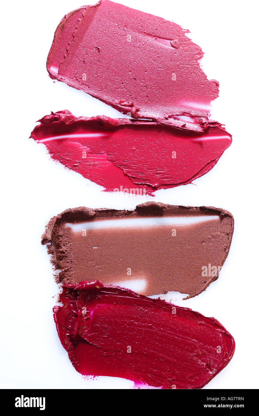 Maquillaje muestras de pintalabios rojo, rosa, tonos oro Fotografía de  stock - Alamy