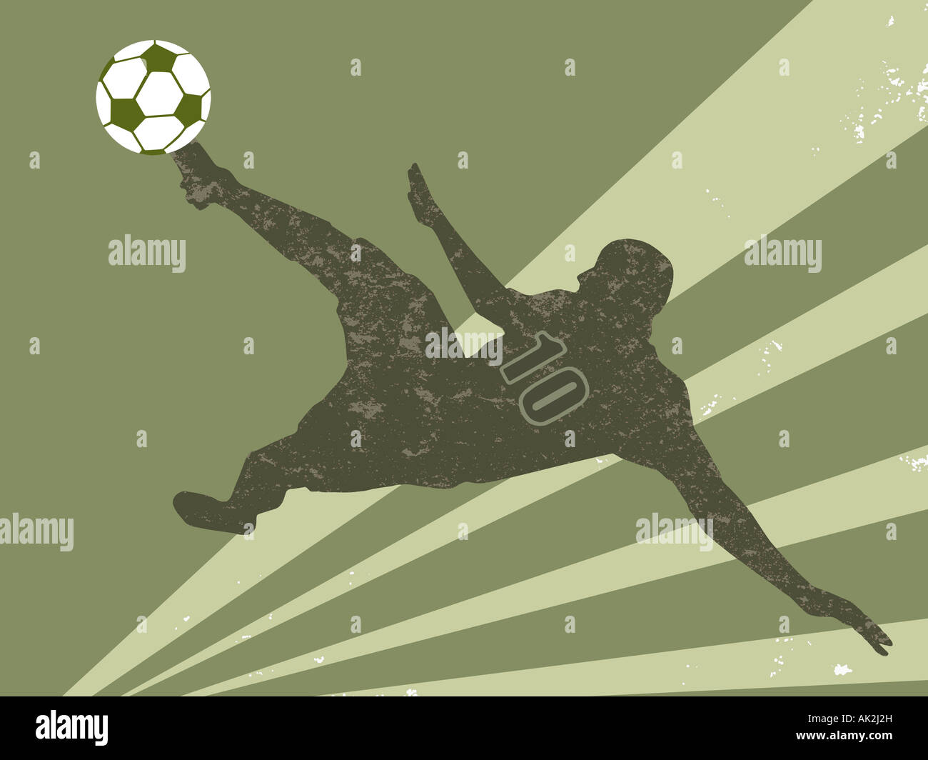 El futbolista en mitad del aire pateando una pelota de fútbol Foto de stock
