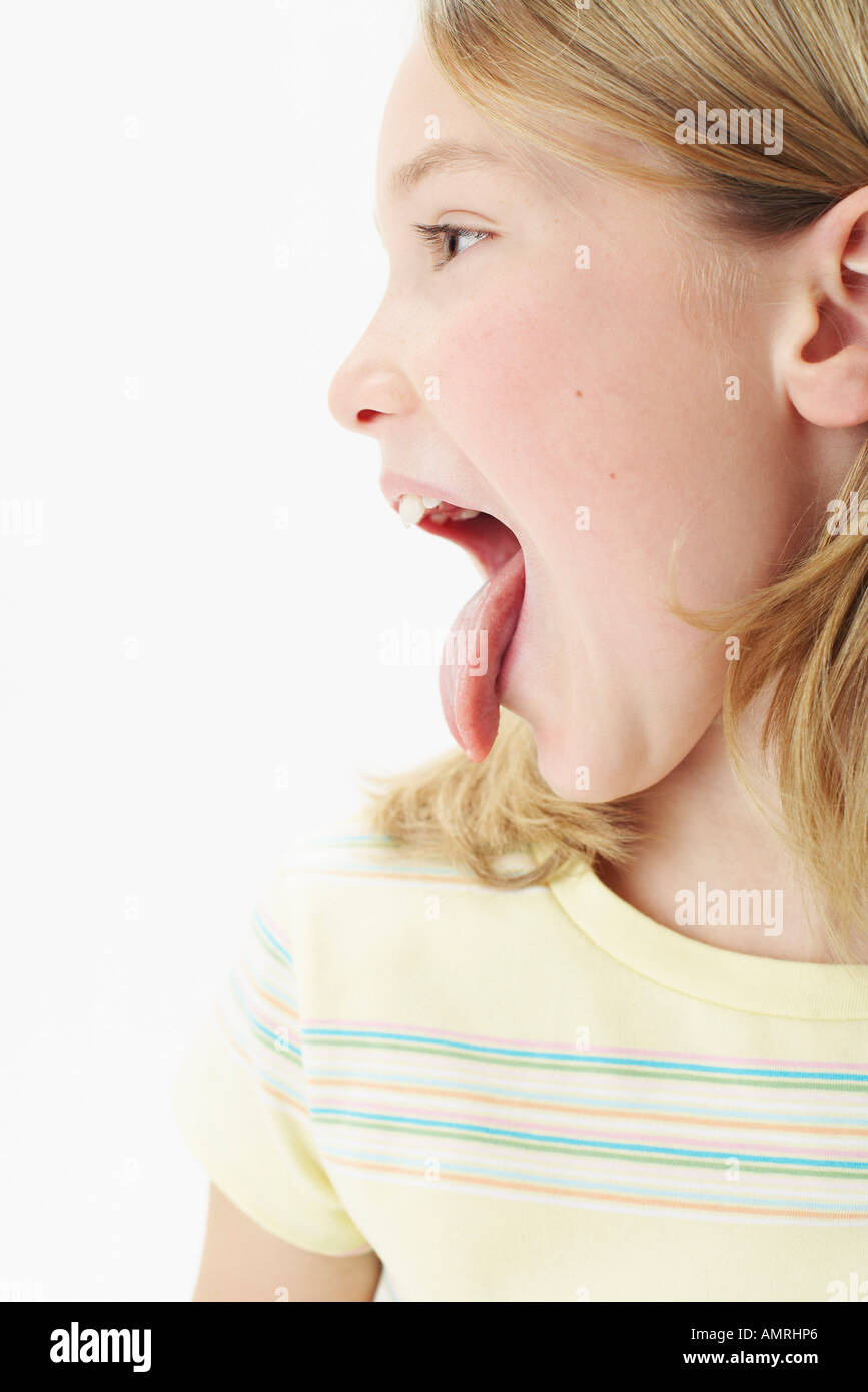 Girl Lengua fuera Foto de stock