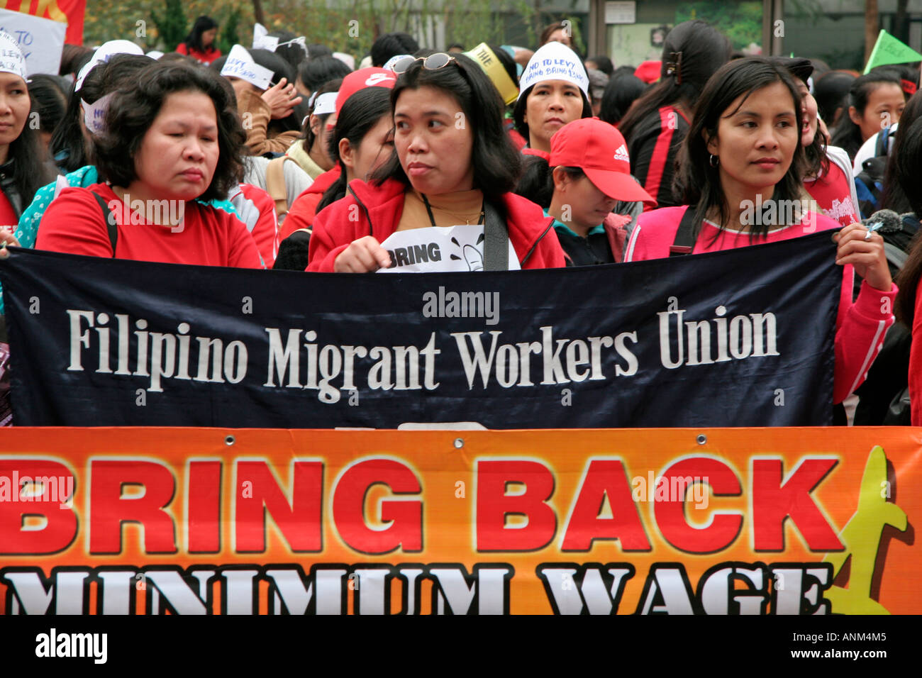 Los trabajadores inmigrantes pagan Hong Kong demostración Foto de stock