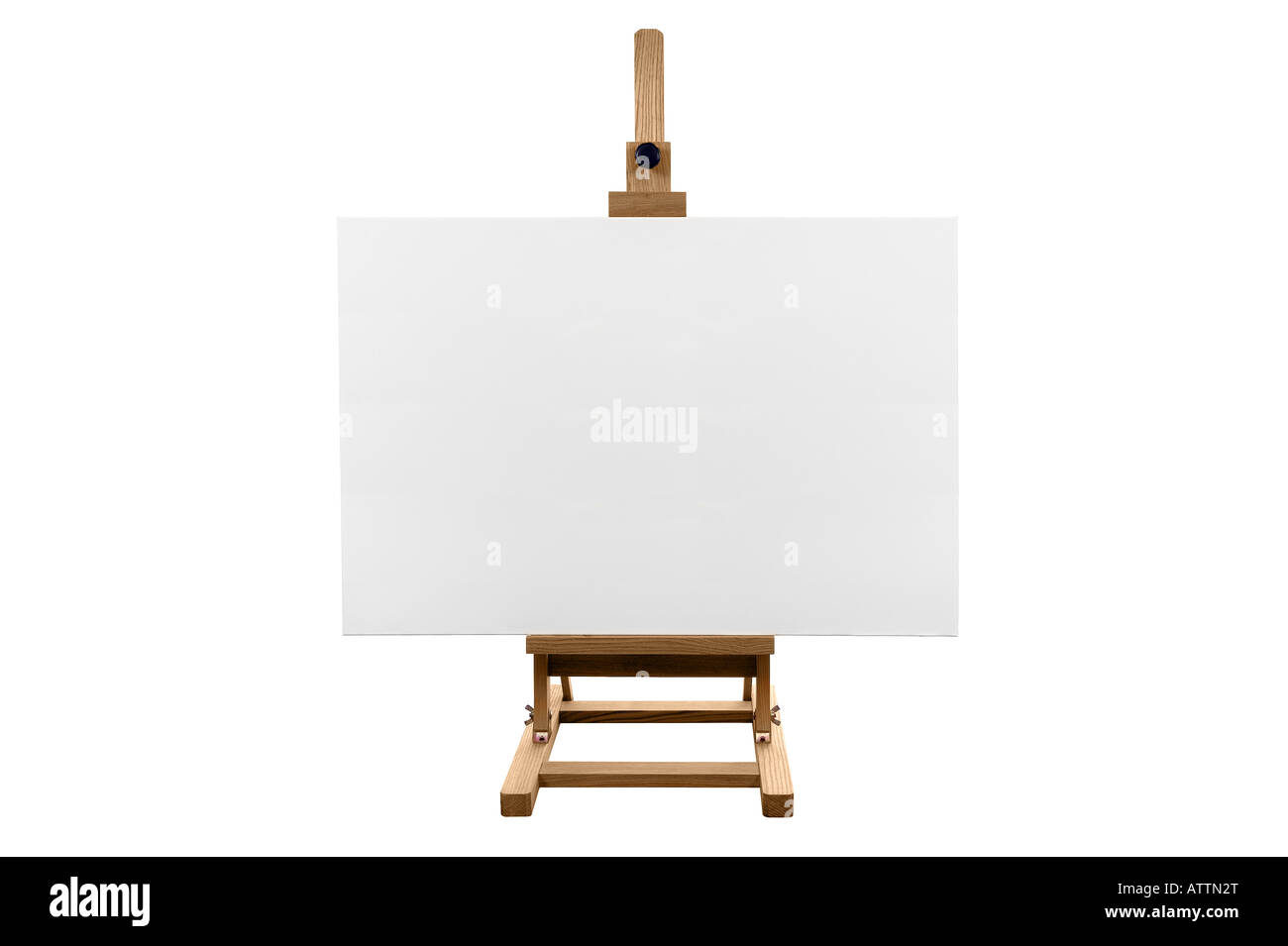 Un auténtico lienzo en blanco sobre un caballete de madera aislado sobre un fondo blanco. Foto de stock