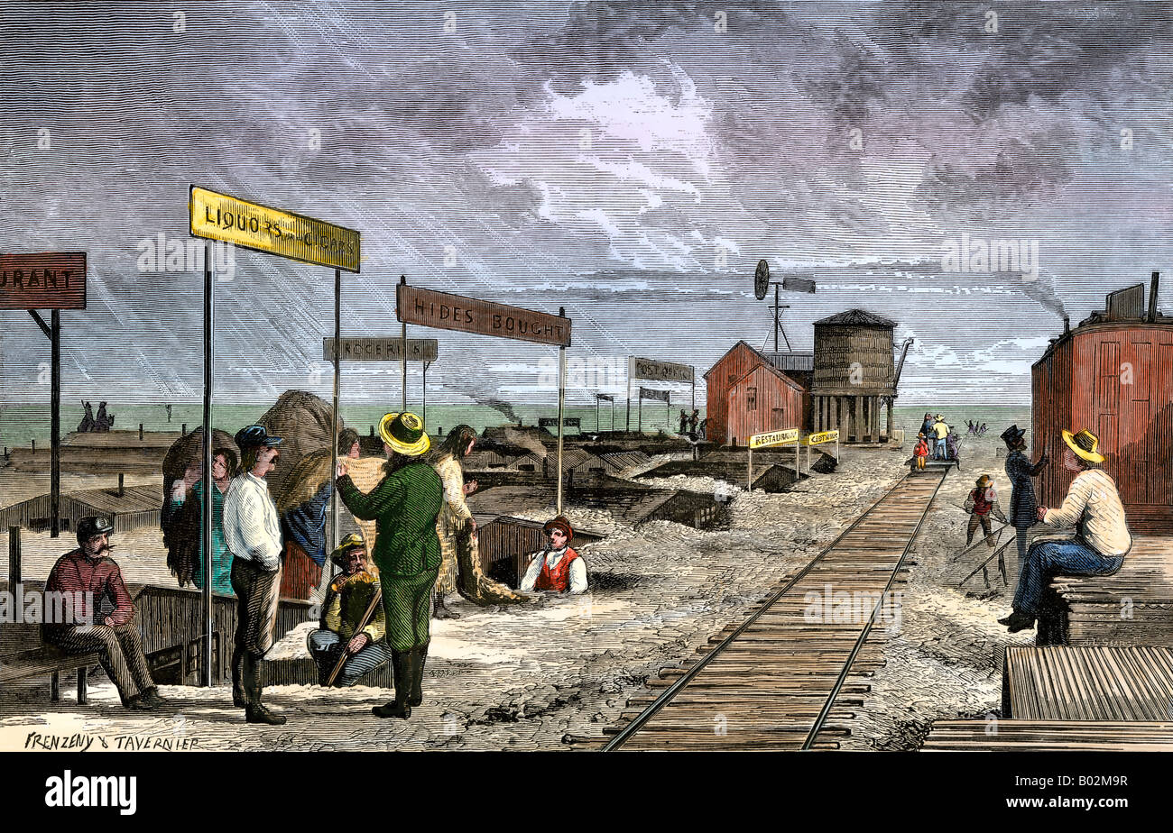 Un pueblo subterráneo de dugouts haciendo negocios a lo largo del ferrocarril transcontinental 1870. Xilografía coloreada a mano Foto de stock