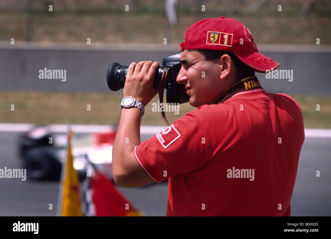 Fan de Ferrari en 2003 en el Gran Premio de España de F1. Circuit de Catalunya, Montmeló, Barcelona, España. Foto de stock
