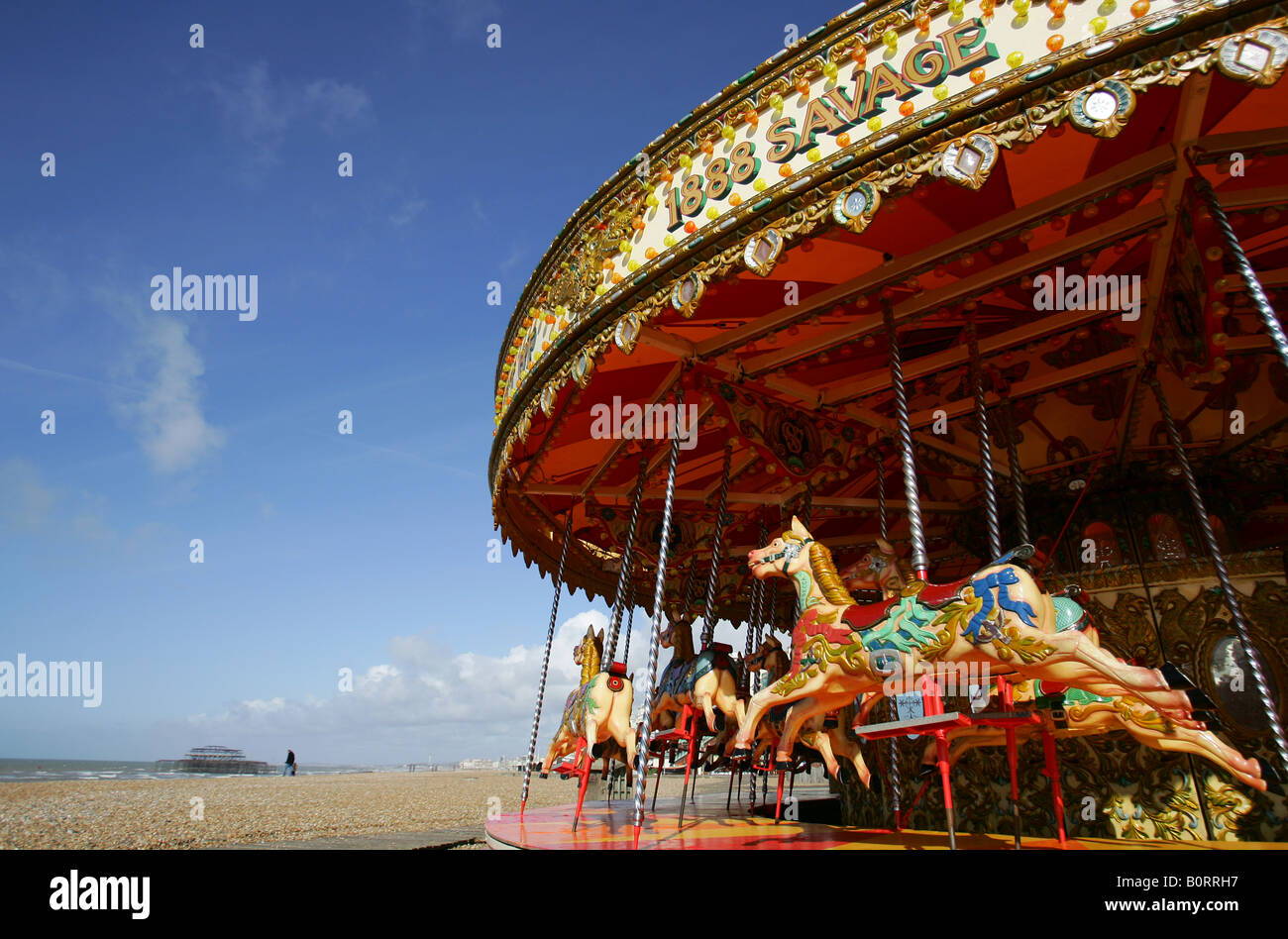 Carrusel en la playa en Brighton Reino Unido Foto de stock