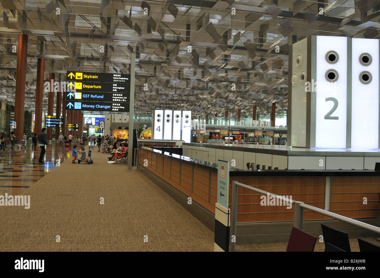 Terminal del aeropuerto internacional de Changi de Singapur 3 Compruebe en Foto de stock