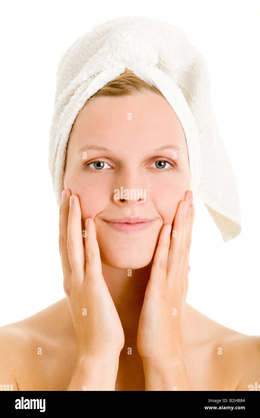 Poner un poco de loción para el cuidado de la piel cuidado de belleza estética Wellness cosmética facial Foto de stock