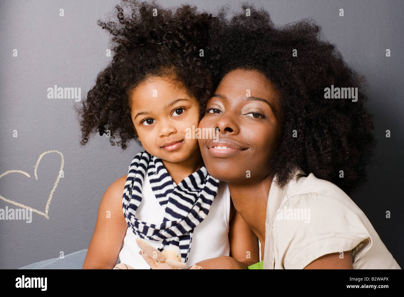 Black mom. Afroamerican with daughter hair. Ebony mother. Black mother daughter Bag. Two Afro curly and straight hair Black.lesbians smile hug.