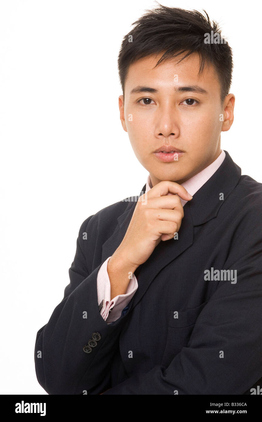 Un empresario chino traje azul marino y camisa rosa de stock - Alamy
