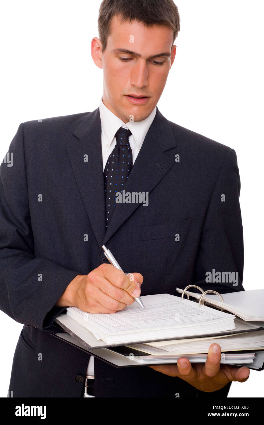 Hombre escrito en archivos Foto de stock