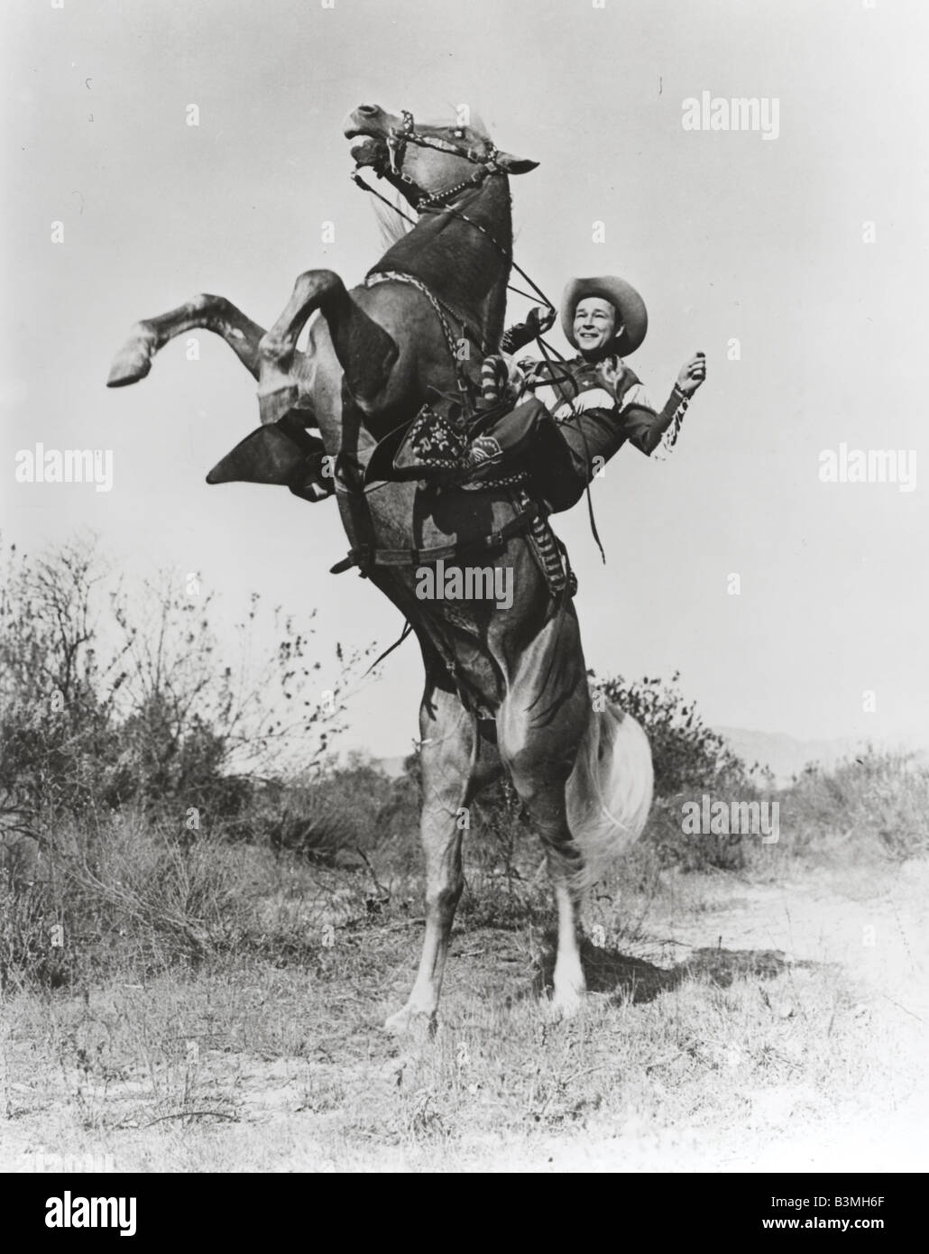 ROY ROGERS película estadounidense actor vaquero en su caballo Trigger Foto de stock