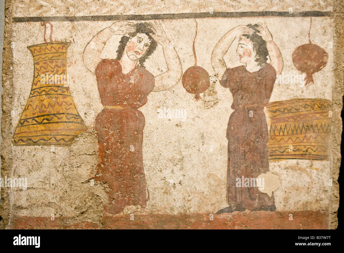 Europa, Italia, Campania, Paestum. Pintura de la tumba de la mujer llorando y tirando del cabello. Foto de stock