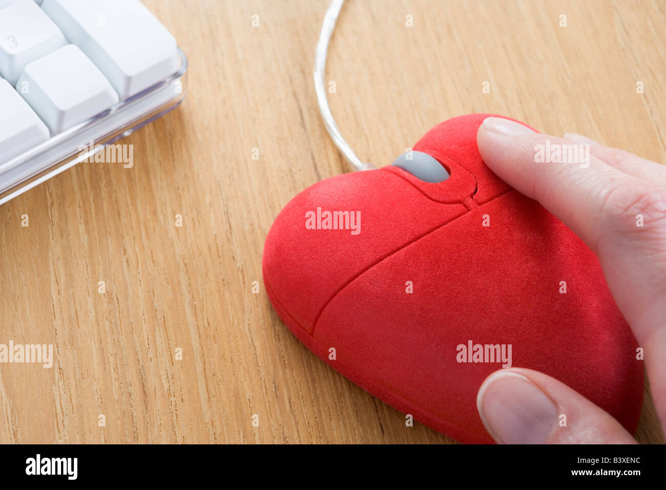 Heart-Shaped ratón de ordenador Foto de stock