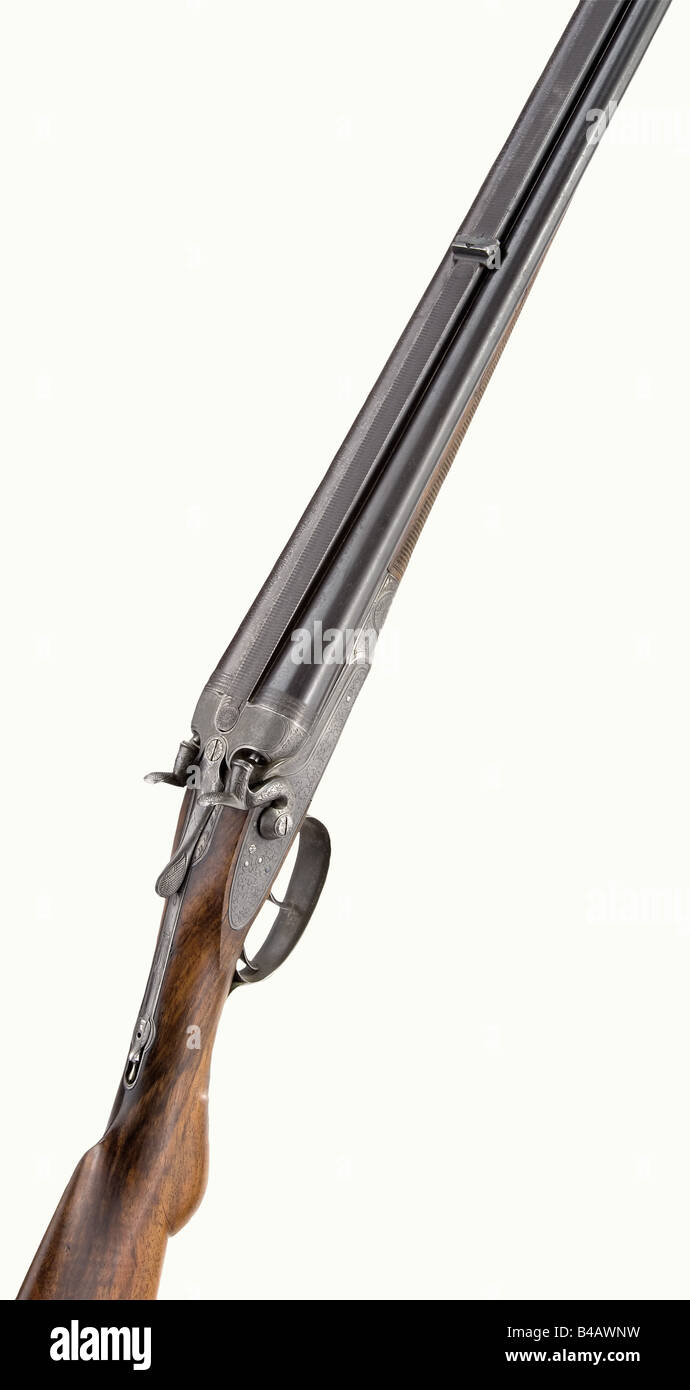 Un rifle/escopeta con martillos visibles, Sauer e son, alrededor de 1910.  Cañón de rifle de calibre 10.75 x 68 mm, cañón de escopeta Damasco de  calibre 16. No 34832. Guiloche decorado en