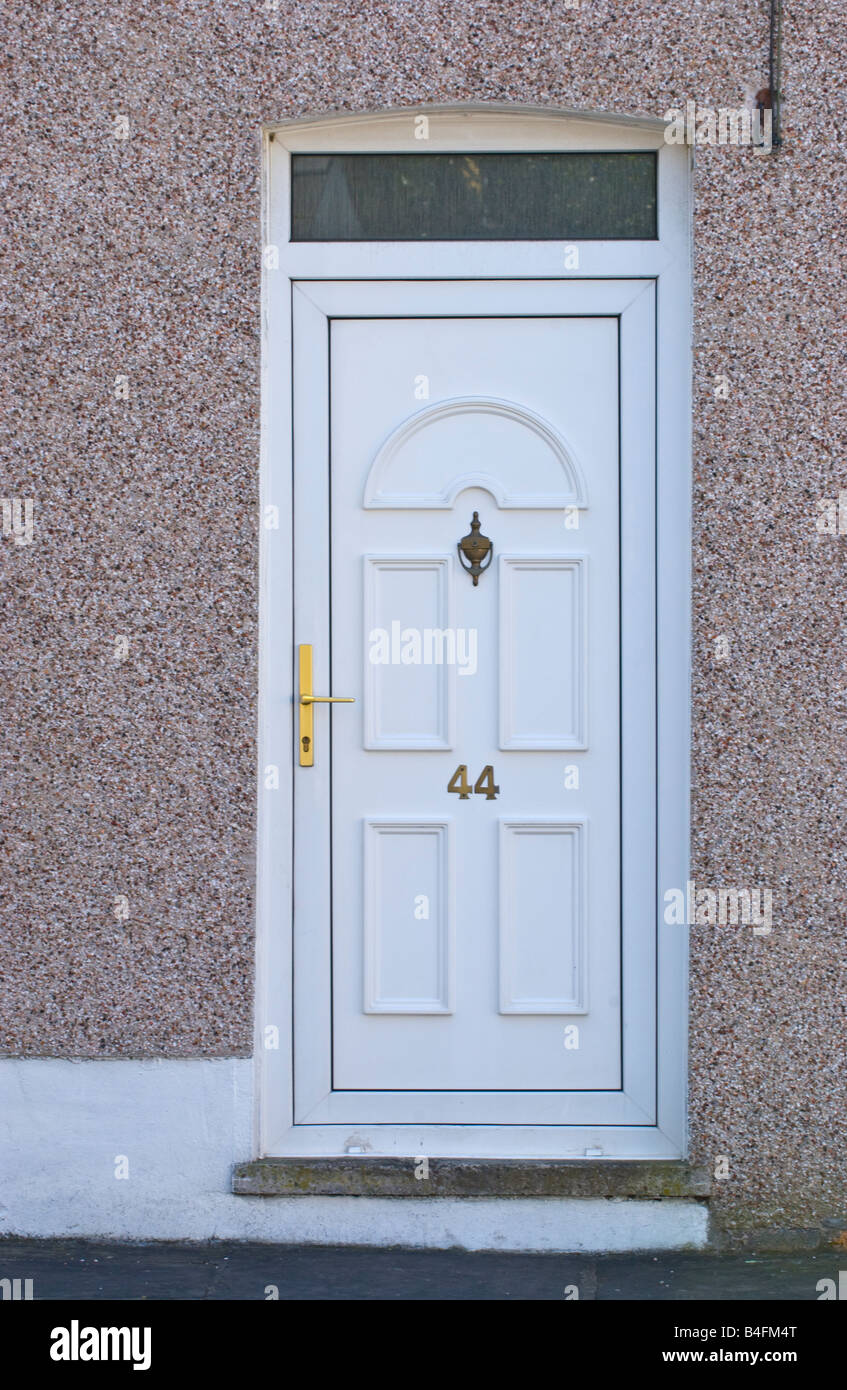 Upvc blanco moderno con puerta acristalada de la casa fanlight UK Foto de stock