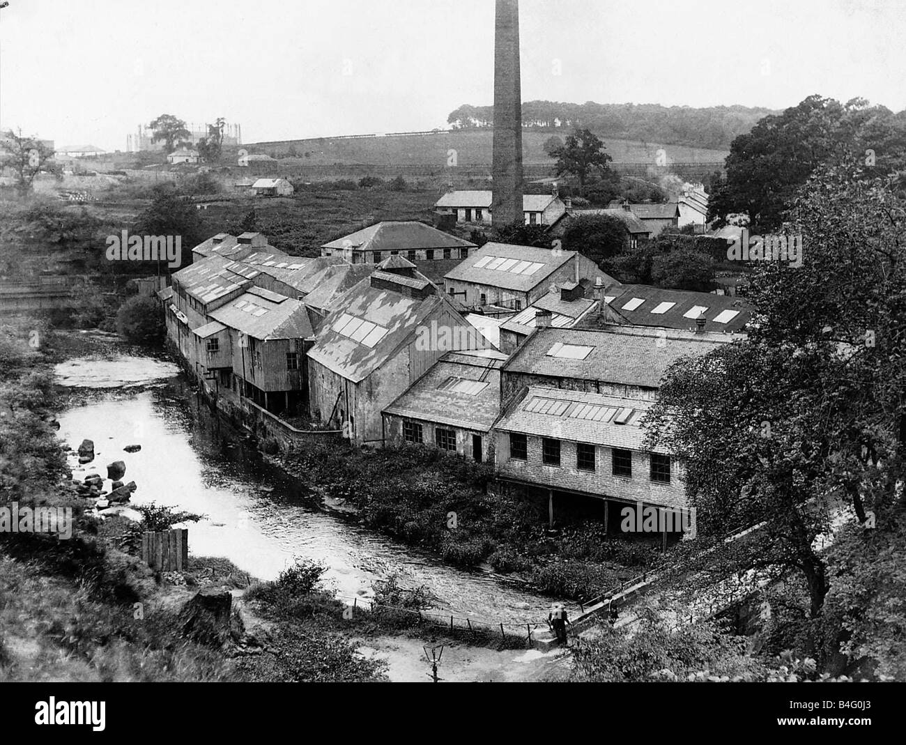 Molino de papel Dawsholm Maryhill Glasgow por el Río Kelvin, junio de 1934 Foto de stock