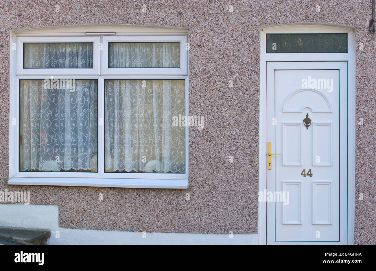 Moderno blanco de UPVC ventana y puerta frontal blanco con acristalamiento de casa fanlight UK Foto de stock