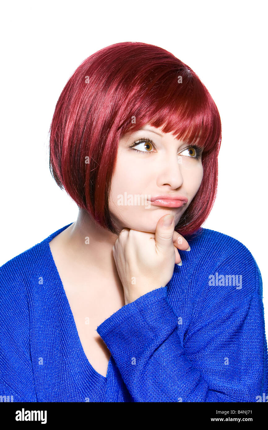 Mujer de pelo rojo la expresión facial imaginar Foto de stock