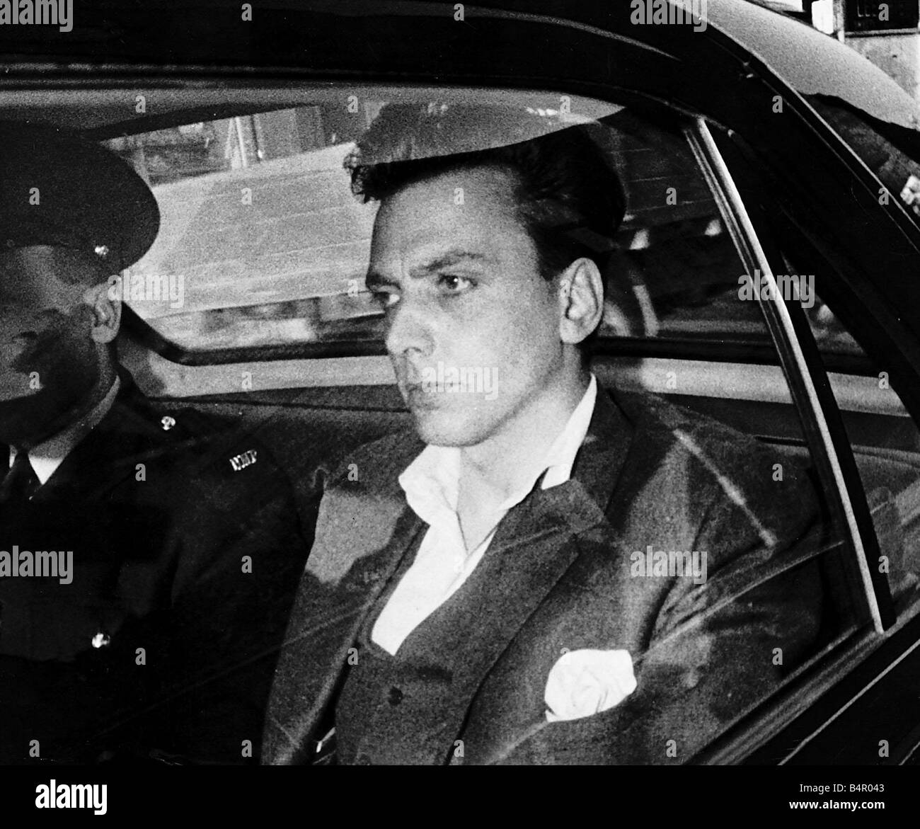 Ian Brady asesino de niños sentados en el coche de la policía disparo a la cabeza el asesinato el 6 de mayo de 1966 Foto de stock