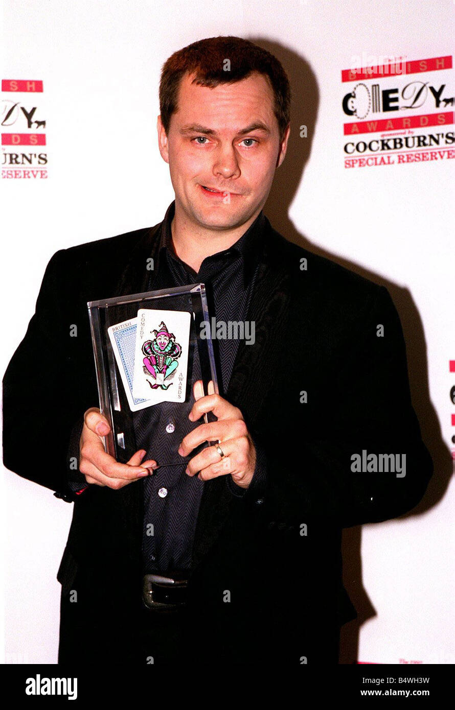 Jack Dee con su comedia de diciembre de 1997, después de ganar el premio Mejor Stand up comic en el 1997 Premios de la comedia Foto de stock