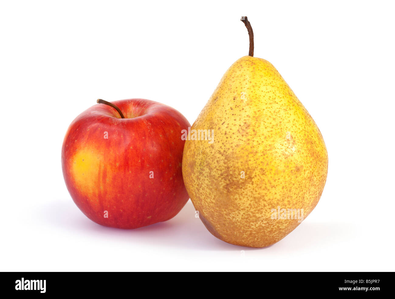 Otoño de frutas (manzana y pera) aislado sobre fondo blanco. Foto de stock