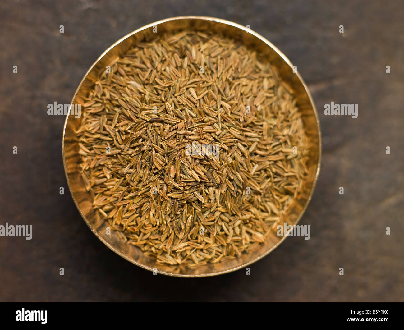 Plato de semillas de comino Foto de stock