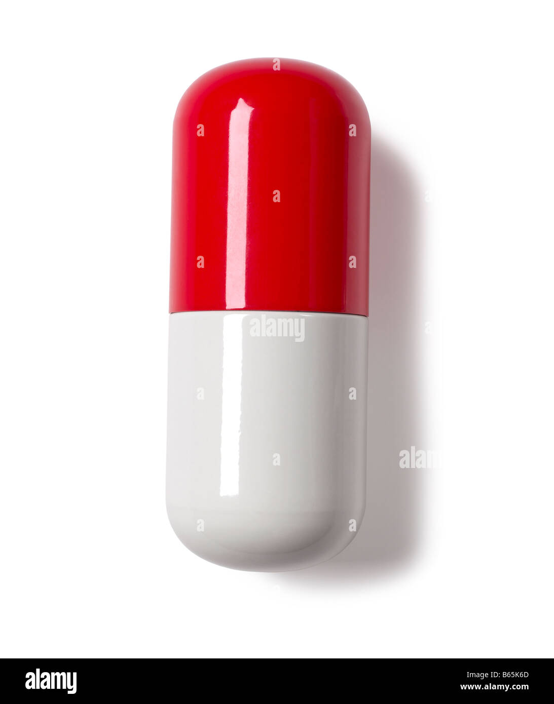 Píldora blanca roja Foto de stock