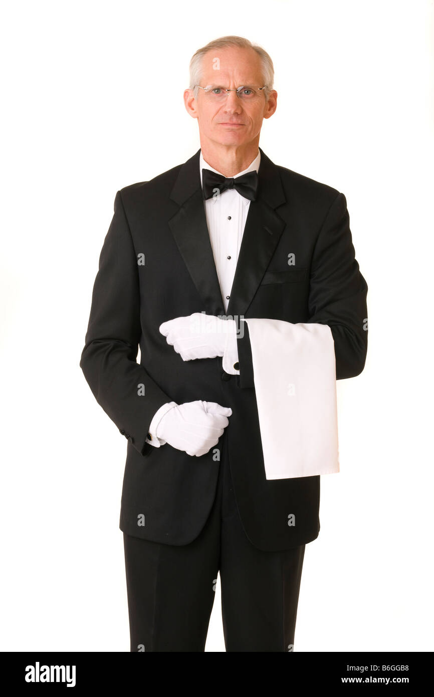 Un hombre con guantes blancos, un Foto de stock 1705765750