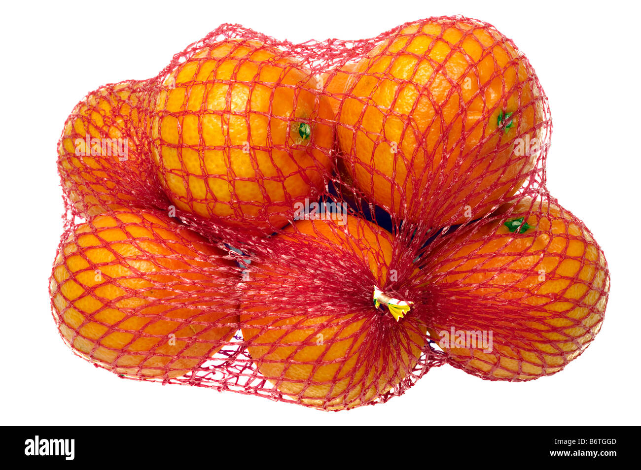 Un pack de clementinas en una bolsa de red de malla roja Foto de stock