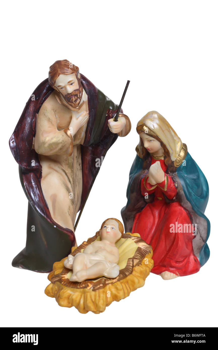 José, María y el Niño Jesús figuras de pesebre recorte aislado sobre fondo blanco. Foto de stock