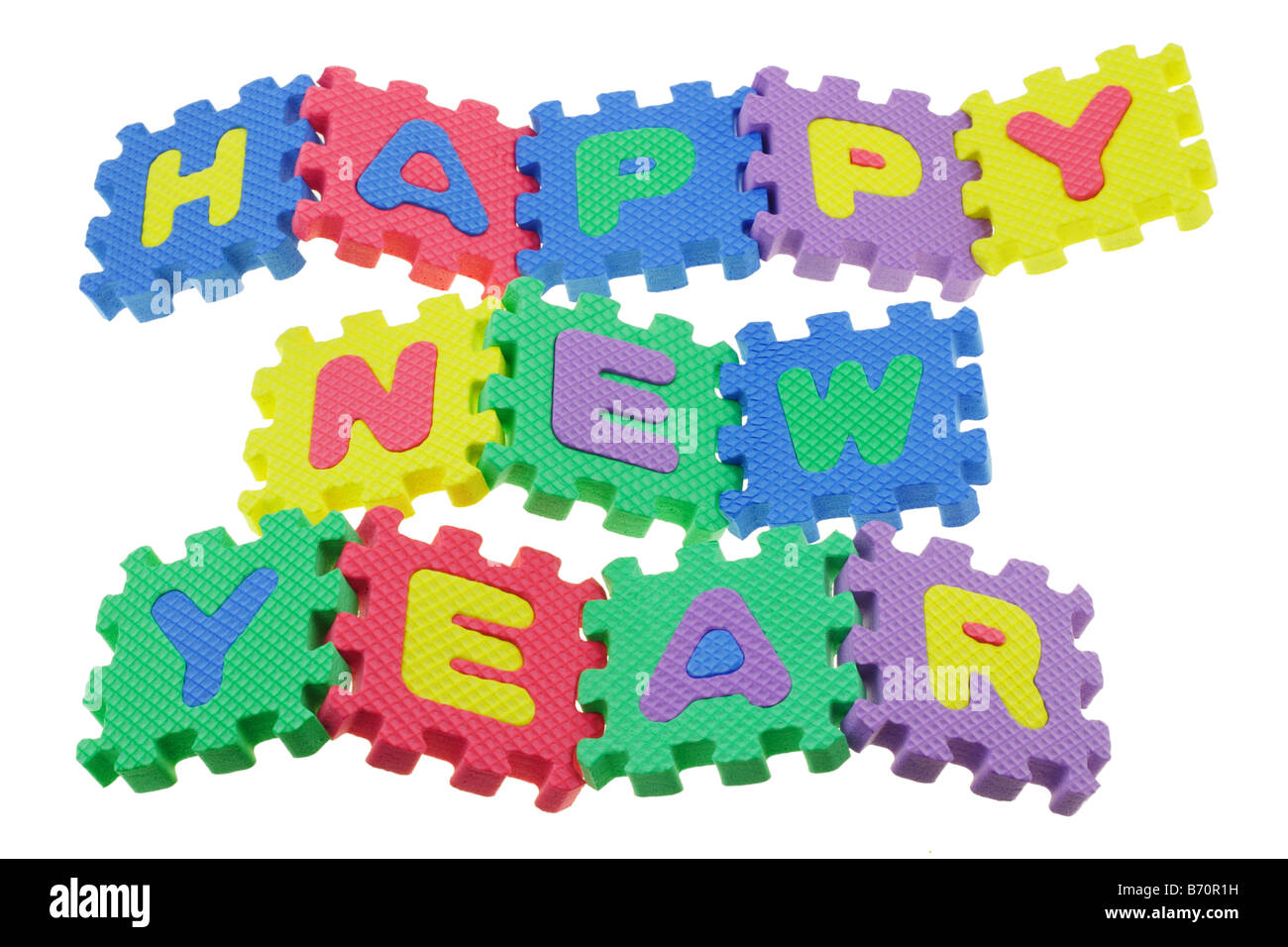 El alfabeto colorido bloques puzzle montado para mostrar Feliz Año Nuevo Foto de stock