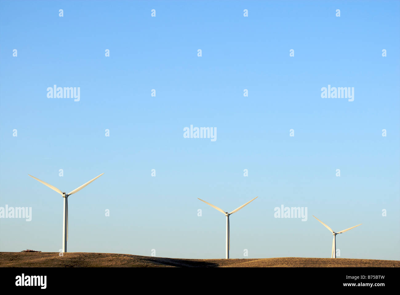 Tres turbinas de viento Foto de stock